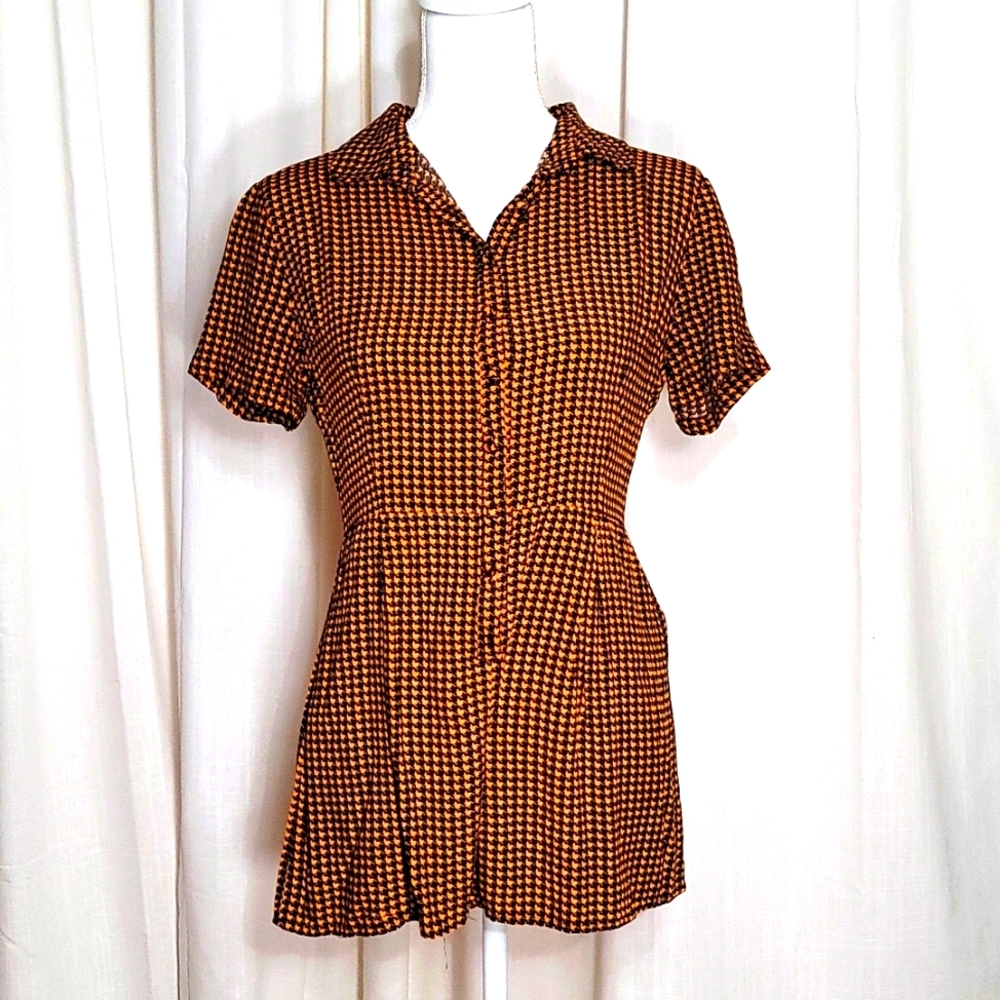 Patterned romper in black and yellow